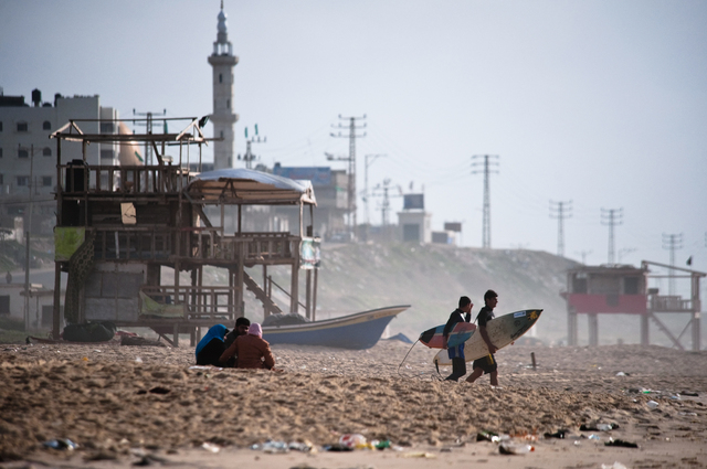Gaza, Ibrahim Arafat and Yosef Abu Ghanem on Al Sheikh Ejlien Beach, the surfers' beach