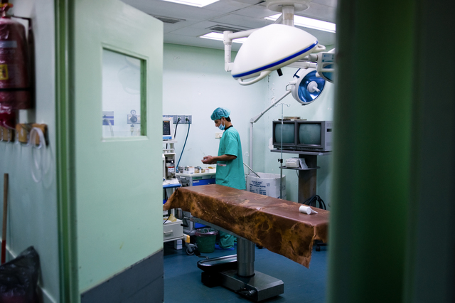 Gaza, surfer Ibrahim Arafat at work at the Kamal Edwan hospital in Beit Lahia, northern Gaza City.