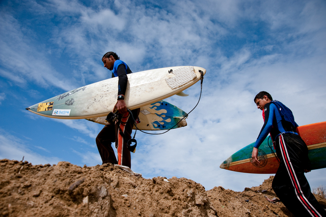 Gaza, Mahmoud Osama Al-Rayashi and Yosef Abu Ghanem go surfing