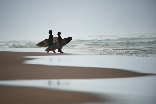 Gaza, Ibrahim Arafat and Yosef Abu Ghanem on Al Sheikh Ejlien Beach, the surfers' beach