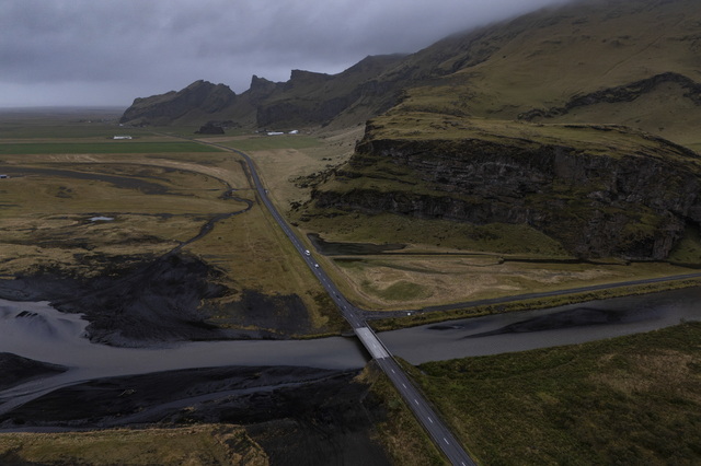 In Rangárþing eystra (Iceland), a bridge spans the River Skógá a few kilometres from the sea. The river has its source in both the Eyjafjallajökull glacier and the westernmost part of the Mýrdalsjökull glacier. One in three foreigners in Iceland lives outside the Reykjavík metropolitan area, working mainly in tourism, fishing and agriculture.