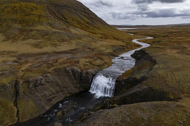 Kjósarskarðsvegur (Iceland), the Þórufoss waterfall on the Laxá í Kjós river, which was used as a filming location for *Game of Thrones*. Þórufoss is situated in the Kjós area, a rural and sparsely populated valley characterised by farmland, small settlements, rivers and gorges. One in three foreigners in Iceland lives outside the Reykjavík metropolitan area, working mainly in tourism, fishing and agriculture.
